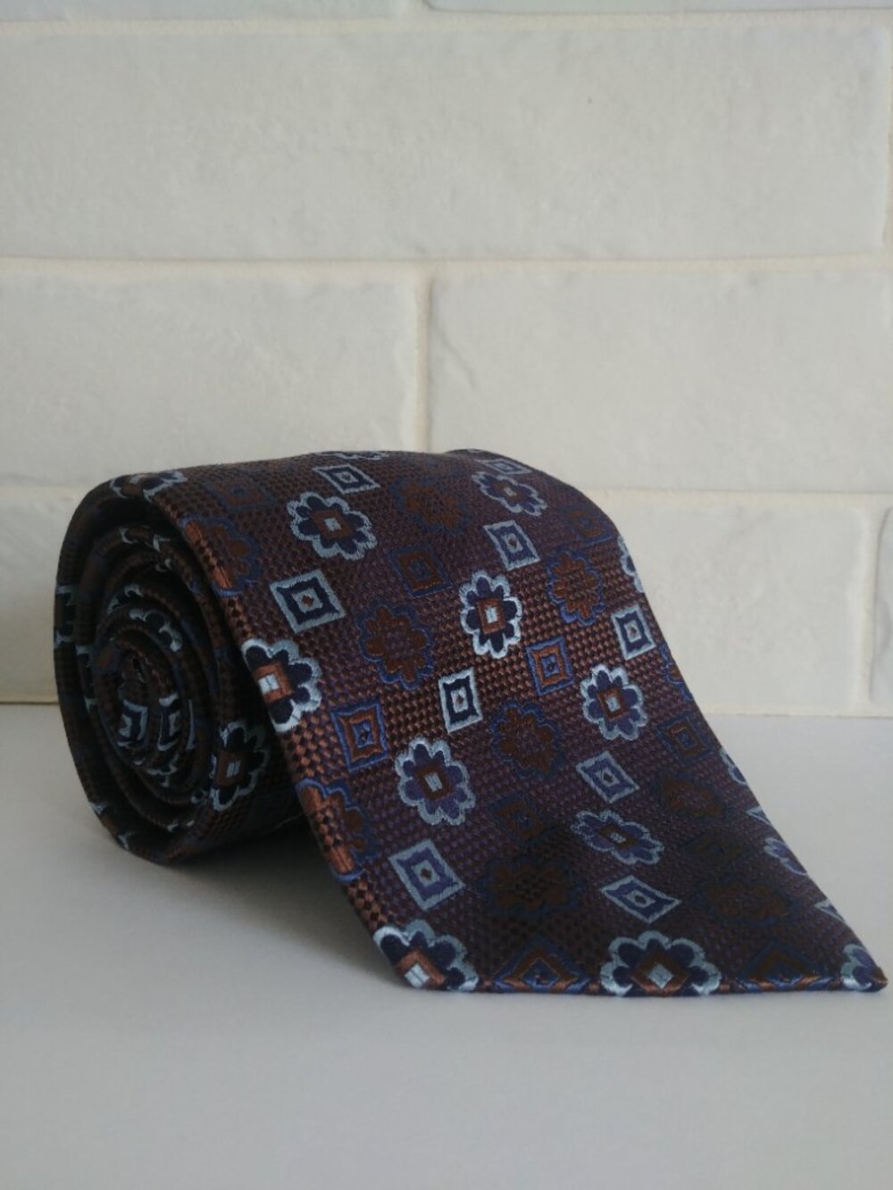 Paul Moretti 100% silk tie brown blue floral geometric pattern